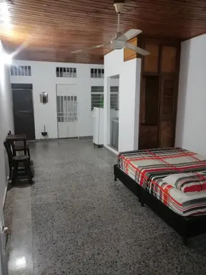 a bedroom with a bed and a ceiling at casa de relajacion lowcost in La Dorada
