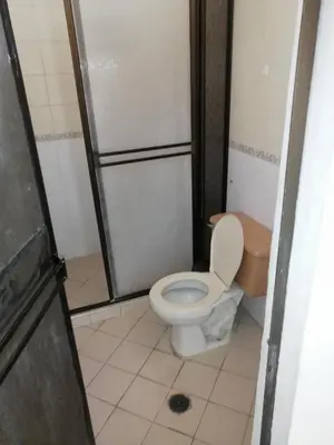 a bathroom with a toilet and a shower at Casa lowcost relajación in La Dorada