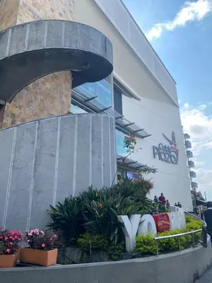 a building with a sign on the side of it at LA CASA DEL CABLE -Comodo Apartamento 102- in Manizales