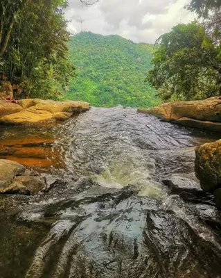 a stream of water in a river with rocks at Apartamento Balcón 302 in San Luis
