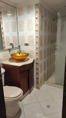 a bathroom with a sink and a toilet and a shower at Habitación con baño privado#5 in Medellín