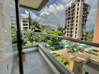 a balcony with a view of a building at 602, Modern apartment in heart of El Poblado + View! in Medellín