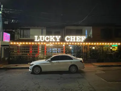 a white car parked in front of a music club at Hotel boutique San Pablo H10 in Medellín