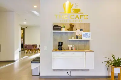 a coffee shop with a sign that reads take a break at The place you need in Poblado-Medellin 1103 in Medellín