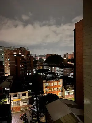 a view of a city with buildings in the background at Apartamento en Laureles con piscina y parquedero 802 in Medellín