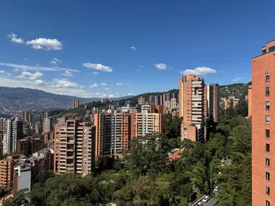 a view of a city with tall buildings at Apartaestudio en el poblado cerca a Povenza 241 in Medellín