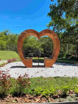 a brick heart sculpture in a park at Camping bajo techo y con estilo in San Rafael