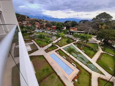 an overhead view of a swimming pool in a park at Luxury apartment citadela di sole , santafe de antioquia in Santa Fe de Antioquia