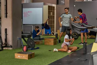 a group of people working out in a gym at Cozy Comforts at Rosa Negra Stadio in Medellín