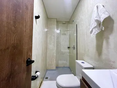 a bathroom with a shower and a toilet at 44 Laureles I Medellín - Modern Loft - Céntrico y excelente ubicación in Medellín
