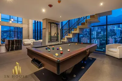 a billiard room with a pool table in a house at Morph 1302 - Spacious & private apt w BBQ/Jacuzzi in El Poblado