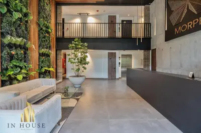 a lobby of a house with plants on the wall at Morph 1401 - Luxe & bright ap in Poblado with AC in El Poblado