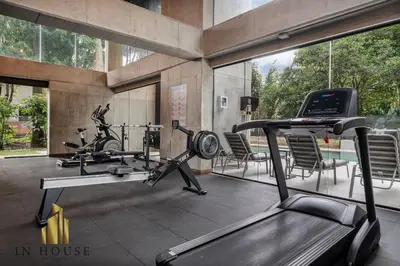 a gym with two exercise bikes and a treadmill at Morph 1601 - Exclusivity in Poblado/Jacuzzi in El Poblado