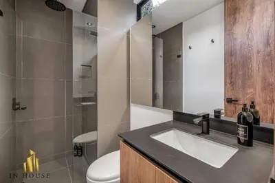 a bathroom with a sink and a toilet at Morph 601 - Elegance & tranquility with AC/BBQ in El Poblado