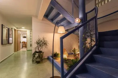 a staircase in a house with plants on it at 303 Balance and Design Loft with AC in Laureles area in Medellín