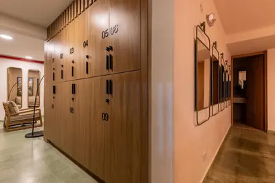 a row of wooden lockers in a hallway at 202 Modern Stay in Laureles Area Cozy Balcony AC in Medellín