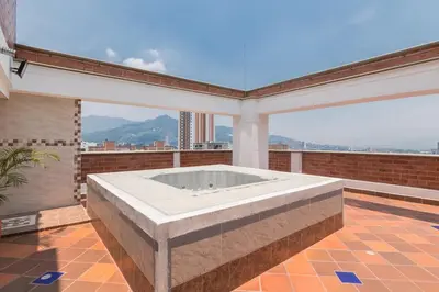 a large bathroom with a large tub on a balcony at 901-Apartamento Central Parque de Sabaneta in Sabaneta