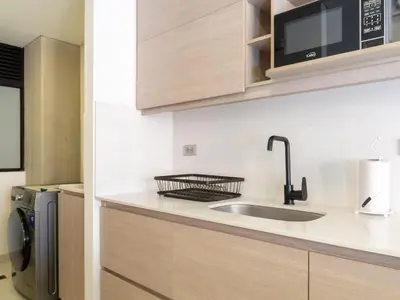 a kitchen with a sink and a microwave at NOK Fantastic 3 BR w Balcony in Laureles Medellin in Medellín