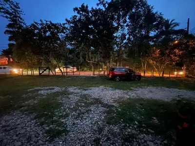 a car parked in a field at night at Casa compartida - Las 5 Quintas in San Rafael