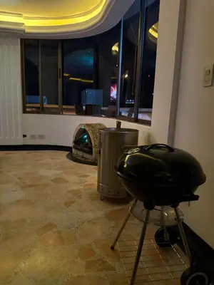 a room with a grill in a room with windows at Tu alojamiento parque caldas in Manizales