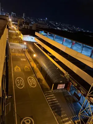 a train station at night with a subway station at Tu alojamiento parque caldas in Manizales