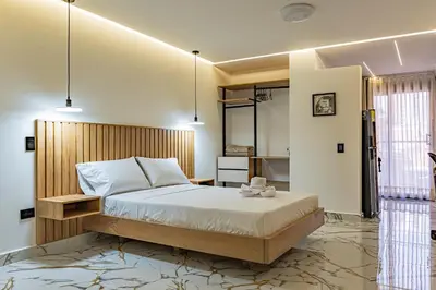 a bedroom with a bed in a room at loft 72 holiday inn medellin in Medellín