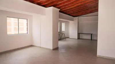 an empty room with white walls and a wooden ceiling at 504-Apartamento 3BR a Pasos del Parque de Sabaneta in Sabaneta