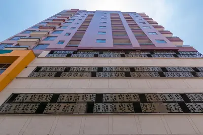 a tall building with a lot of windows at 504-Apartamento 3BR a Pasos del Parque de Sabaneta in Sabaneta